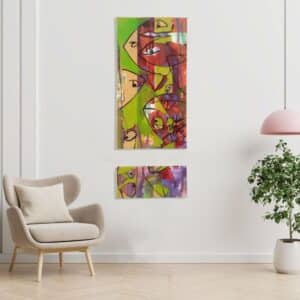tableau deux pieces art abstract pendu près d'une sofa et plante